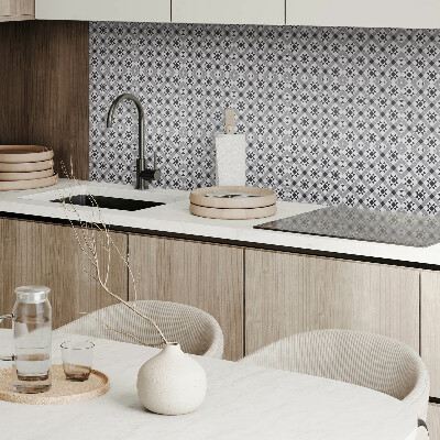 Self adhesive vinyl floor tiles A star motif in a geometric form