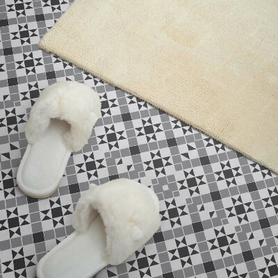 Self adhesive vinyl floor tiles A star motif in a geometric form