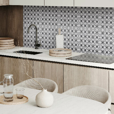 Self adhesive vinyl floor tiles A star motif in a geometric form
