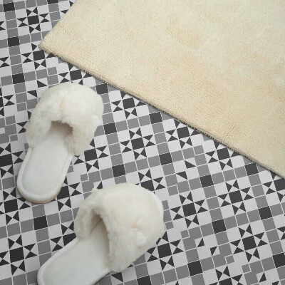 Self adhesive vinyl floor tiles A star motif in a geometric form