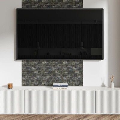 Self adhesive vinyl floor tiles A pattern imitating a stone wall