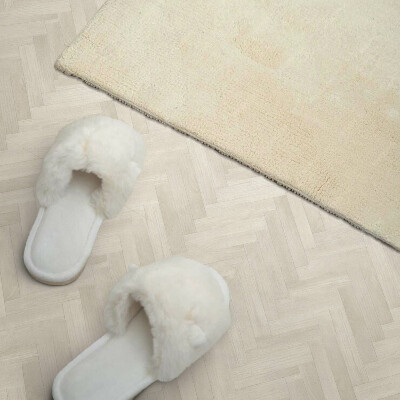 Self adhesive vinyl floor tiles Herringbone pattern in wood