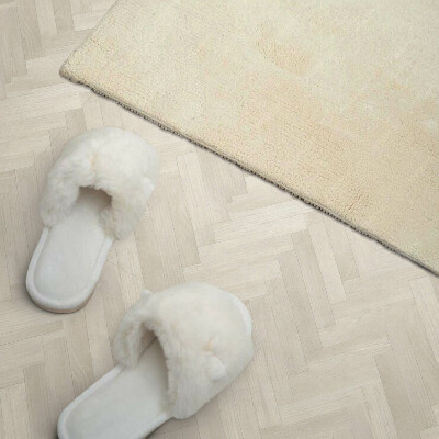 Self adhesive vinyl floor tiles Herringbone pattern in wood