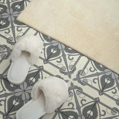 Self adhesive vinyl floor tiles Symmetrical floral motif