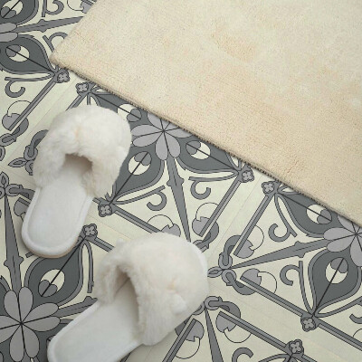 Self adhesive vinyl floor tiles Symmetrical floral motif