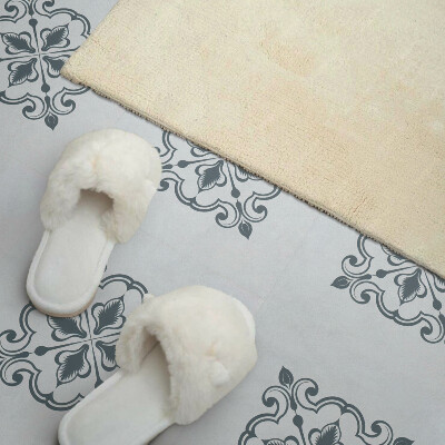 Self adhesive vinyl floor tiles Ornaments with a plant motif