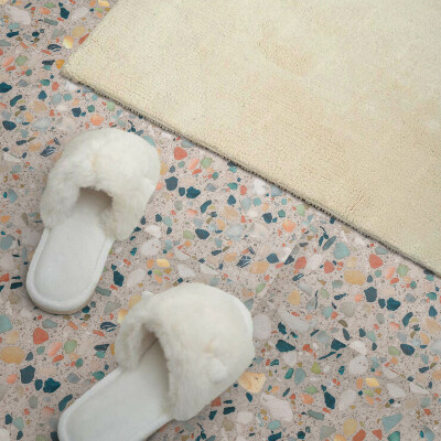 Self adhesive vinyl floor tiles A motif with various stones