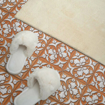 Self adhesive vinyl floor tiles An elegant floral motif