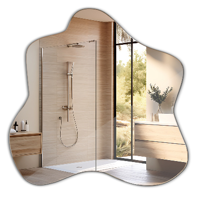 Mirror with asymmetrical stain