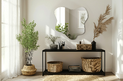 Mirror with asymmetrical stain