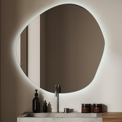 Irregular shaped lighted mirror