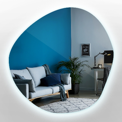 Irregular shaped lighted mirror