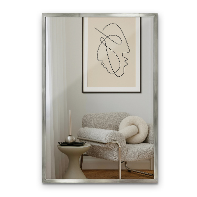 Rectangular wall hanging mirror with a silver frame