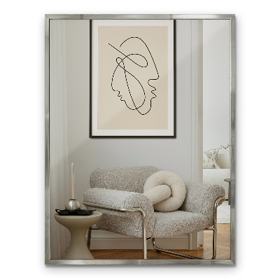 Rectangular wall hanging mirror with a silver frame