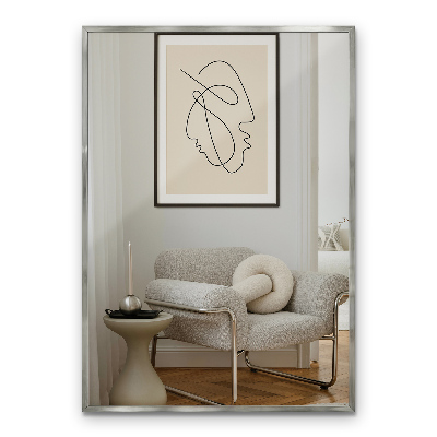 Rectangular wall hanging mirror with a silver frame