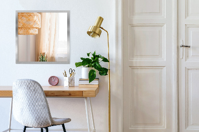 Rectangular wall hanging mirror with a silver frame