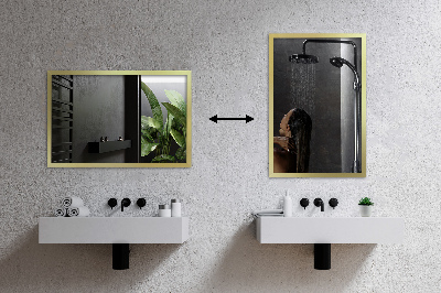 Decorative rectangular wall mirror with a gold frame