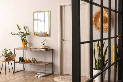 Decorative rectangular wall mirror with a gold frame