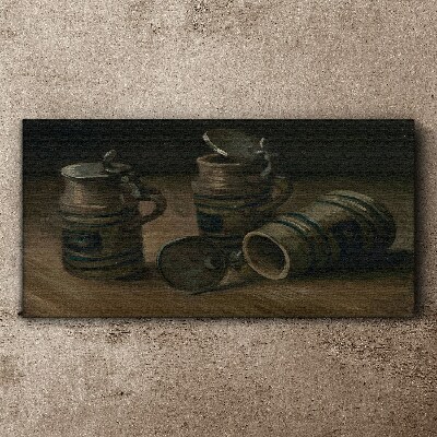 Antique mugs on the table Canvas print