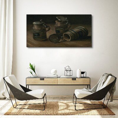 Antique mugs on the table Canvas print