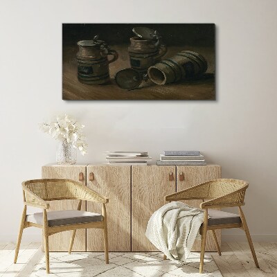 Antique mugs on the table Canvas print