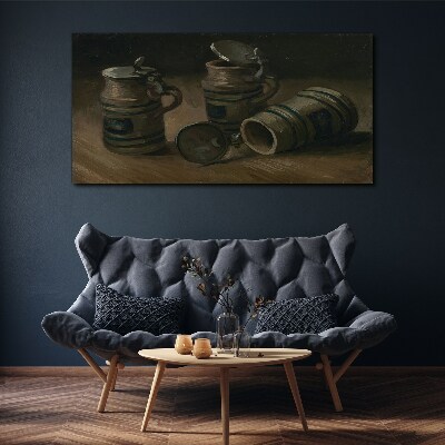 Antique mugs on the table Canvas print