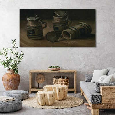 Antique mugs on the table Canvas print