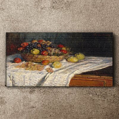 Fruit basket on a white tablecloth Canvas print