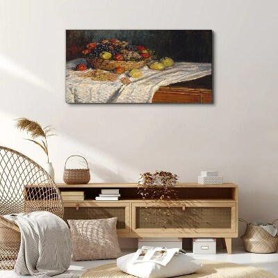 Fruit basket on a white tablecloth Canvas print