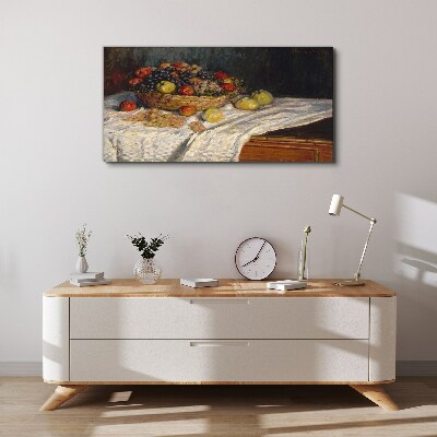 Fruit basket on a white tablecloth Canvas print