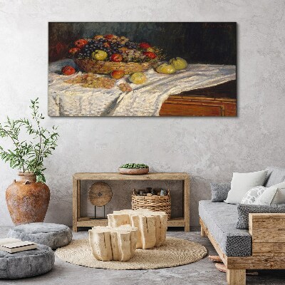 Fruit basket on a white tablecloth Canvas print
