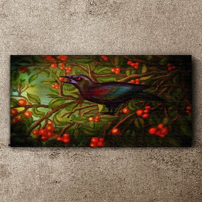 A bird on a fruit branch in the background Canvas print