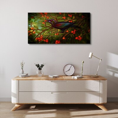 A bird on a fruit branch in the background Canvas print