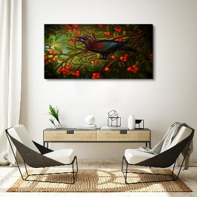 A bird on a fruit branch in the background Canvas print