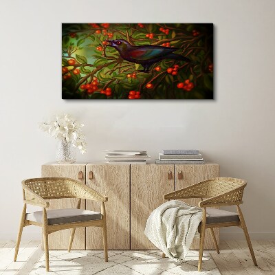 A bird on a fruit branch in the background Canvas print