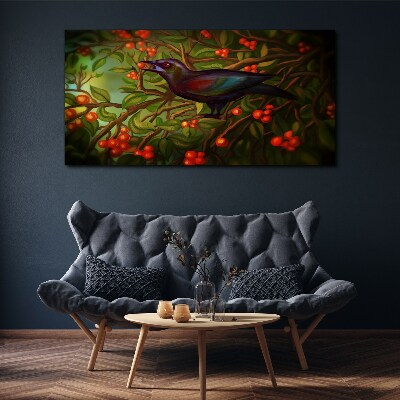 A bird on a fruit branch in the background Canvas print