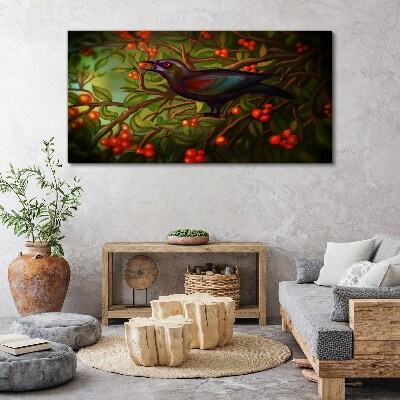A bird on a fruit branch in the background Canvas print
