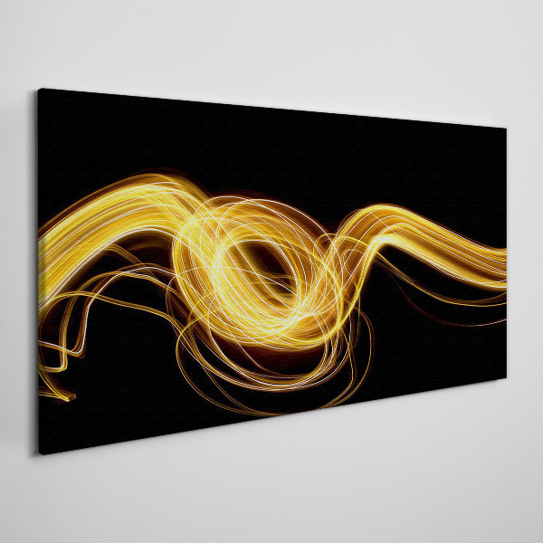 Golden streaks of light on black Canvas print