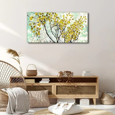 Spring leaves against the blue background Canvas print