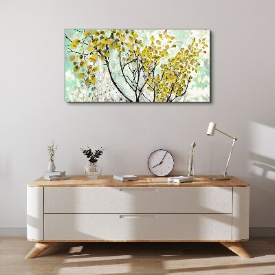 Spring leaves against the blue background Canvas print