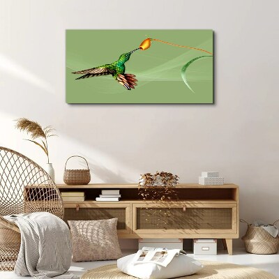 Hummingbird at a flower Canvas Wall art