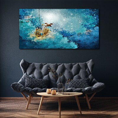 A caged bird against the sky Canvas Wall art