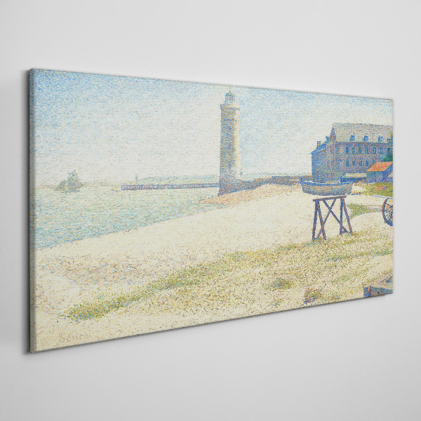 A lighthouse on the seashore Canvas print