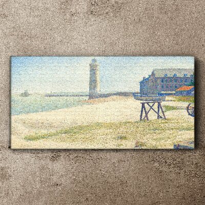 A lighthouse on the seashore Canvas print