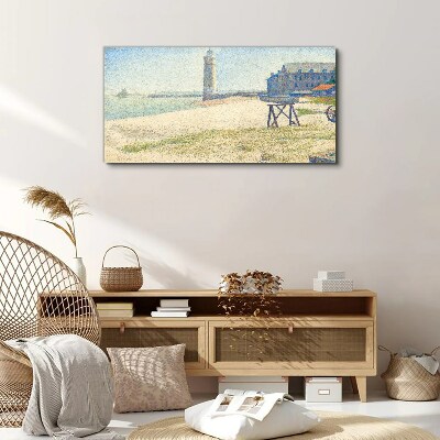 A lighthouse on the seashore Canvas print