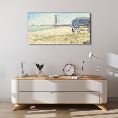 A lighthouse on the seashore Canvas print