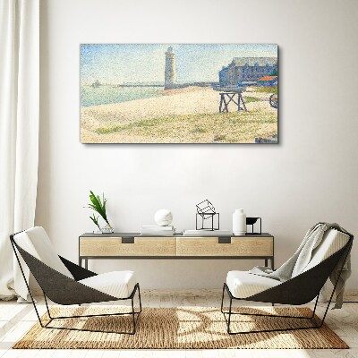 A lighthouse on the seashore Canvas print