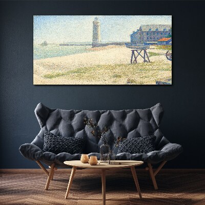 A lighthouse on the seashore Canvas print