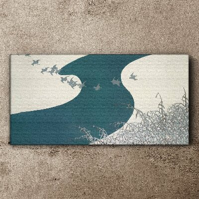 A calm river with birds flying away Canvas print