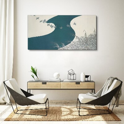 A calm river with birds flying away Canvas print